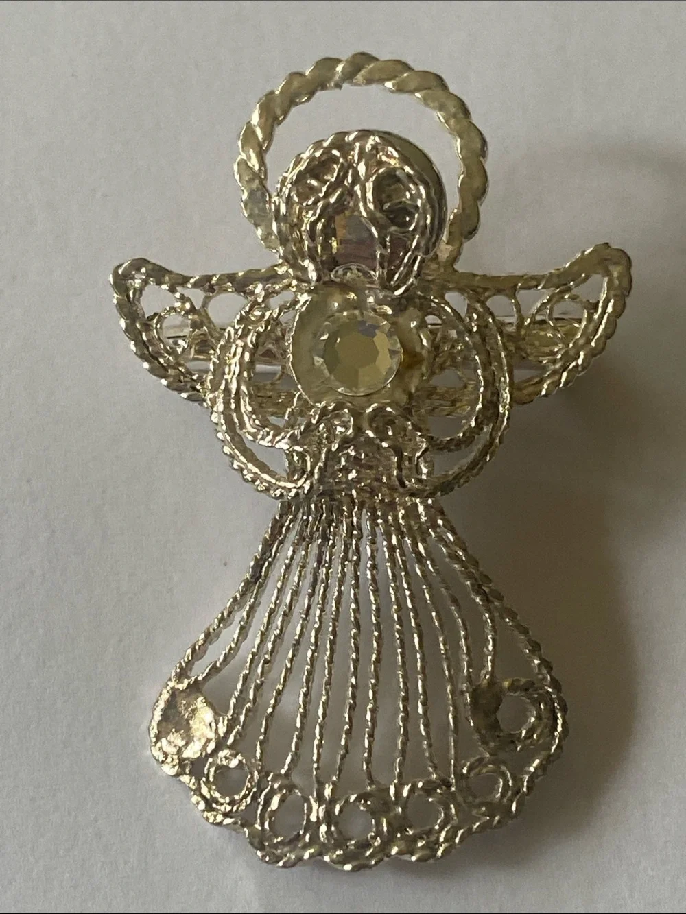Silver tone vintage angel brooch